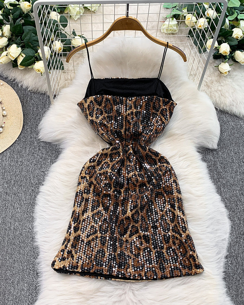 Leopard sequin mini dress on hanger, V-back with spaghetti straps