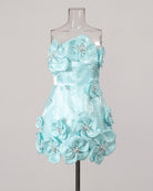 Sky blue strapless corset mini dress on mannequin with 3D floral appliques and rhinestones