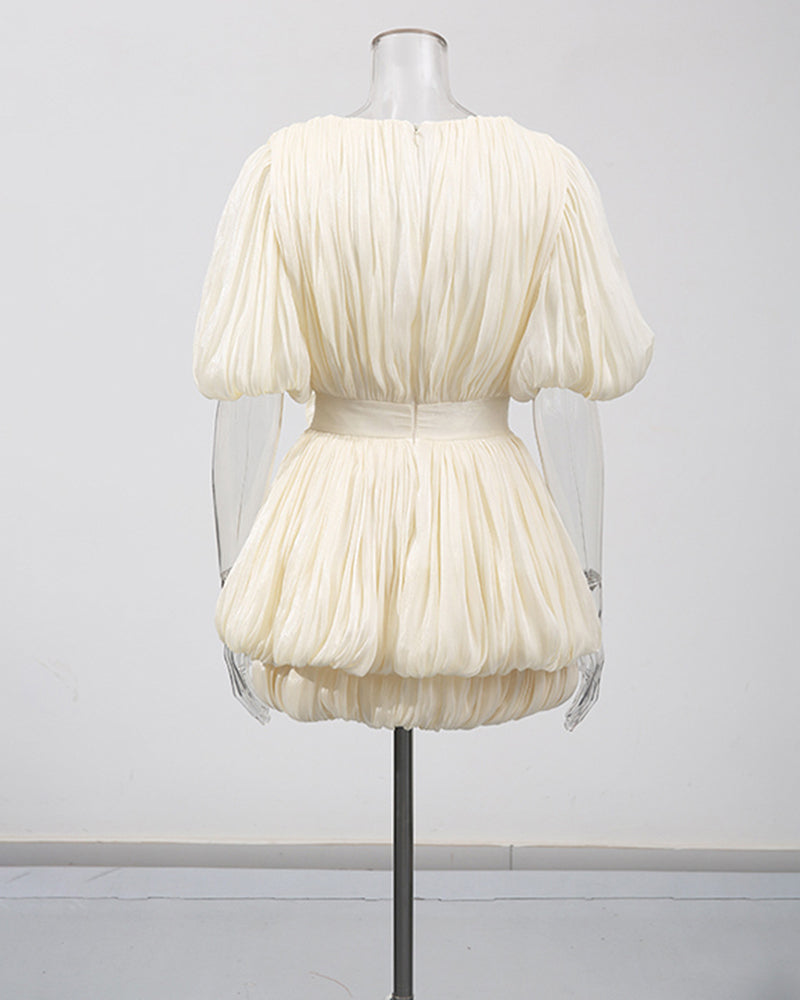 Champagne pleated mini dress with puff sleeves and gathered waist