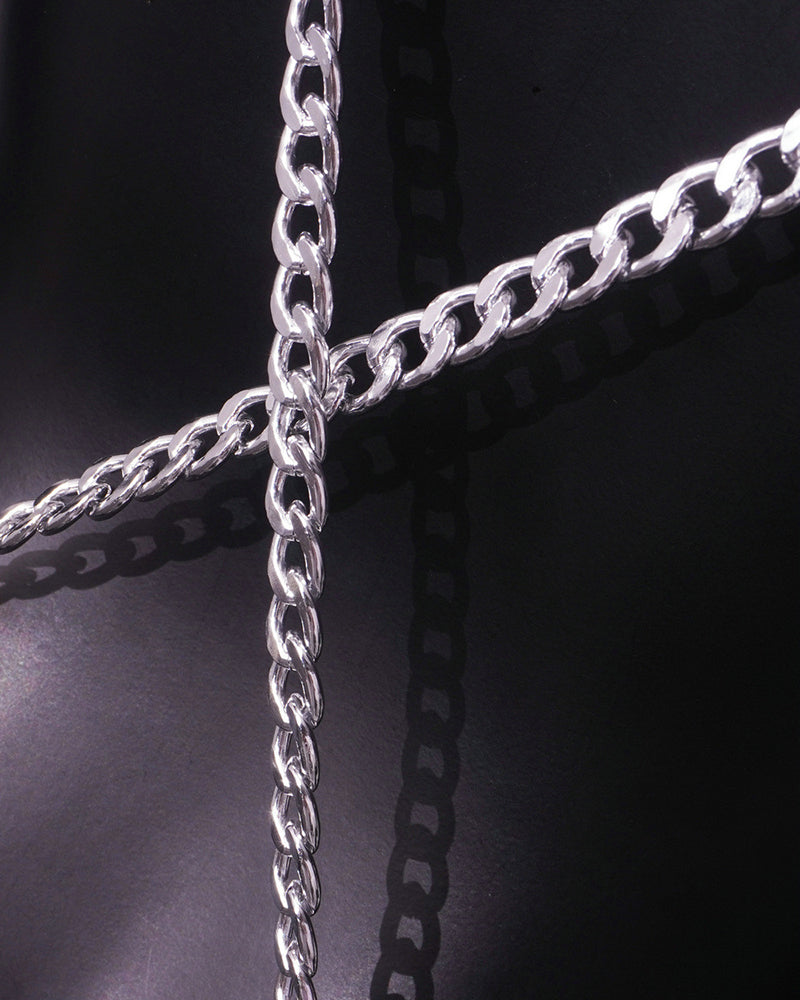 Silver chain links and connector rings detail on diamond-cut PVC mesh