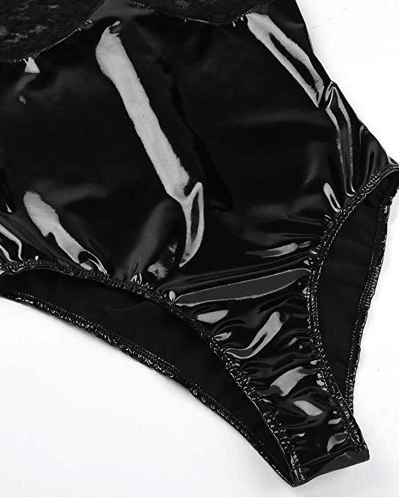 Glossy black faux leather bodysuit fabric with stitched edge, close-up detail