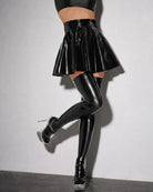 Black wet-look pleated mini skirt with high-gloss flared pleats