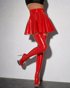 Red wet-look pleated mini skirt with shiny flare and pleated panels