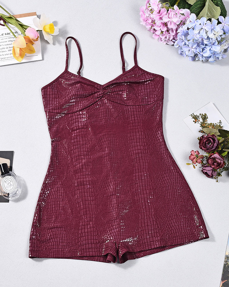Burgundy croc-embossed faux leather V-neck spaghetti strap romper bodysuit, flat lay