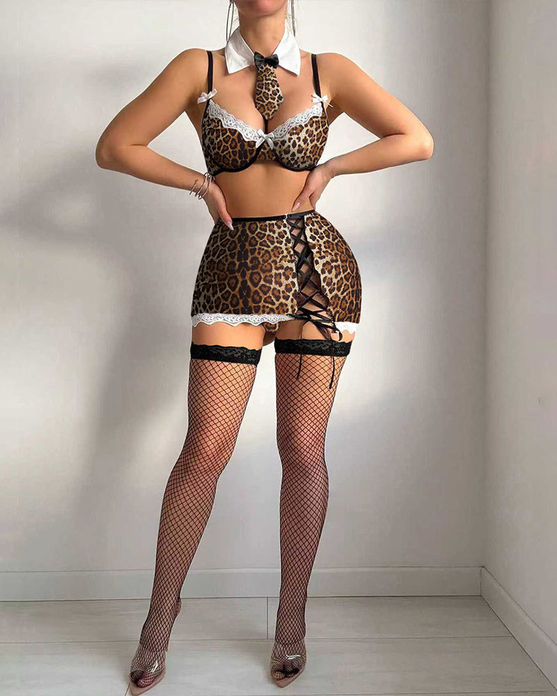 Leopard print lingerie set with tie-front bra, mini skirt, lace trim and mesh stockings