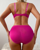 Rose pink cutout bodysuit with spaghetti straps; open back and midriff shape
