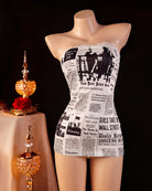 Sheer mesh mini dress with newspaper print bandeau top and short hem