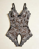 Black and white floral lace crotchless teddy with v-neck and bow-strap ties