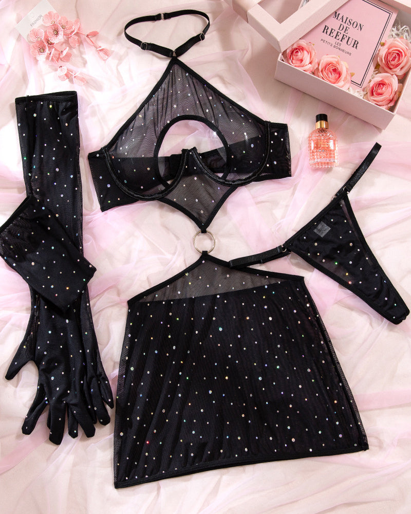 Black rhinestone mesh dress set laid flat: mini dress, thong, gloves, bra top