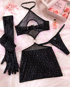 Black rhinestone mesh dress set laid flat: mini dress, thong, gloves, bra top