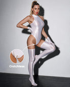 White wet-look mock neck bodysuit with crotchless thong, gloves, thigh-high stockings