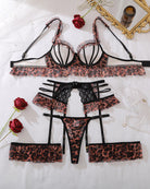 Flat lay leopard print lingerie set: bra, garter belt, thong, and matching stockings