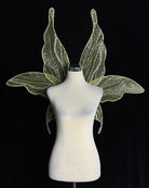 Yellow-green glitter fairy wings with vein-like shimmer lines, shown on a mannequin
