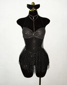 Black rhinestone halter mini dress with mesh fringe hem on a mannequin