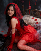 Red vampire bridal costume mini dress with tulle skirt, veil, fishnet stockings and gloves
