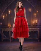 Red sleeveless tulle midi dress with tiered skirt, ruffled lace collar, and belt.