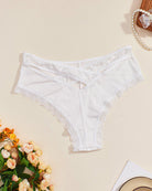 White mid-rise criss-cross bikini panties with lace trim