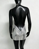 Silver metallic chain halter mini dress with open back and draped chain fringe
