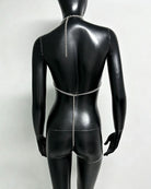Silver metallic chain halter bra top back on mannequin with center chain detail