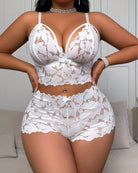 White floral lace lingerie set with underwire bra and ruffle lace shorts, bow front