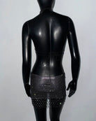 Black rhinestone mesh cut-out crop top and shorts set on mannequin, back view