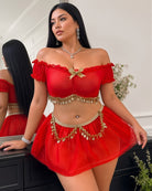 Red off-shoulder sheer crop top with bow detail, tulle mini skirt, gold coin chain belt