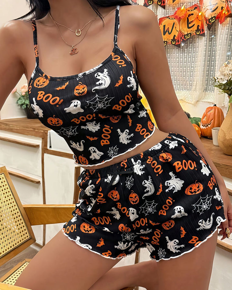 Black Halloween pajama set with cami crop top and matching ruffle shorts, boo and pumpkin print