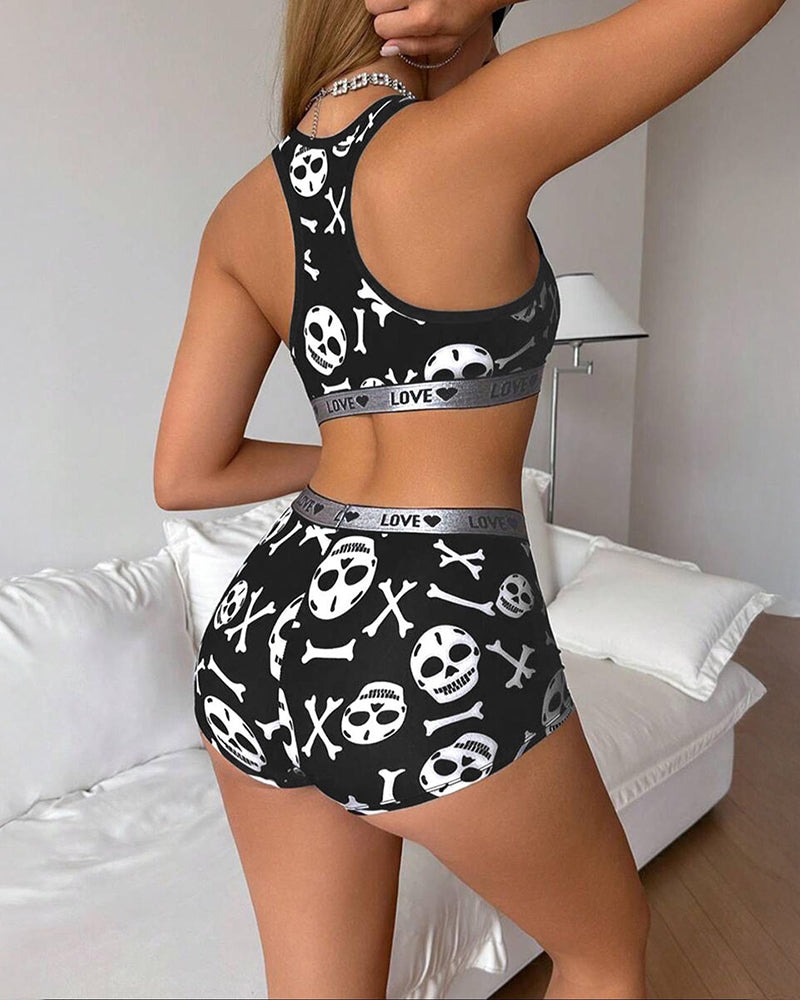 Black skull-print racerback sports bra and boyshorts lounge set, side back view