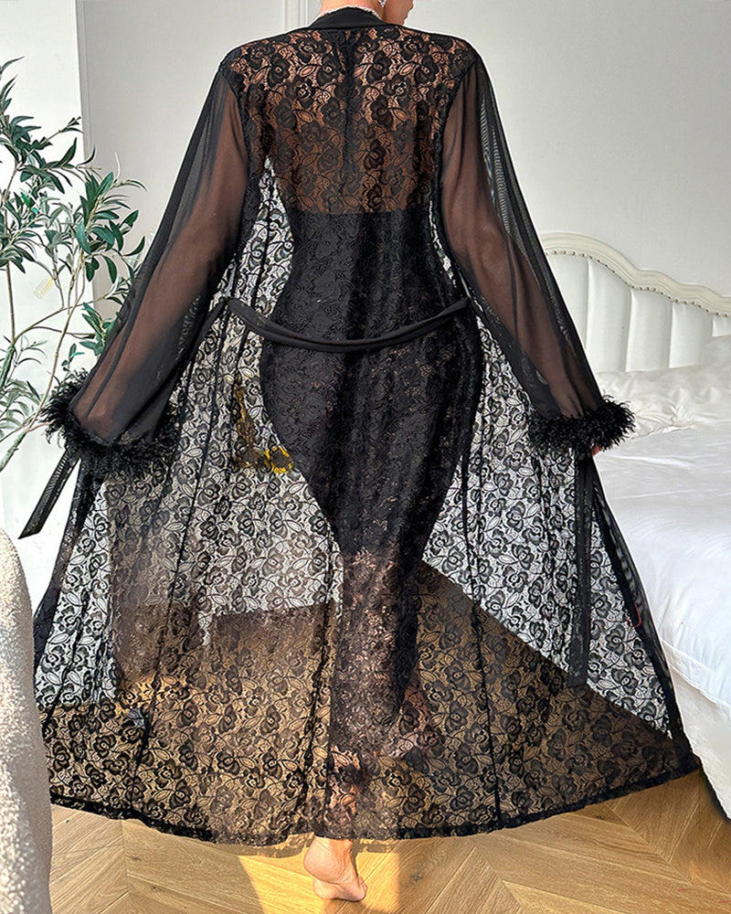 Black lace robe over patterned skirt, sheer sleeves with feather trim and back lace panel