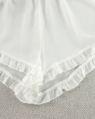 White chiffon shorts hem with layered ruffle trim