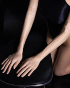Beige oil-shiny sheer opera gloves with long sleeves and sheer glossy appearance