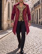 Men's burgundy tailcoat jacket with gold ornate foil print and patterned cuffs