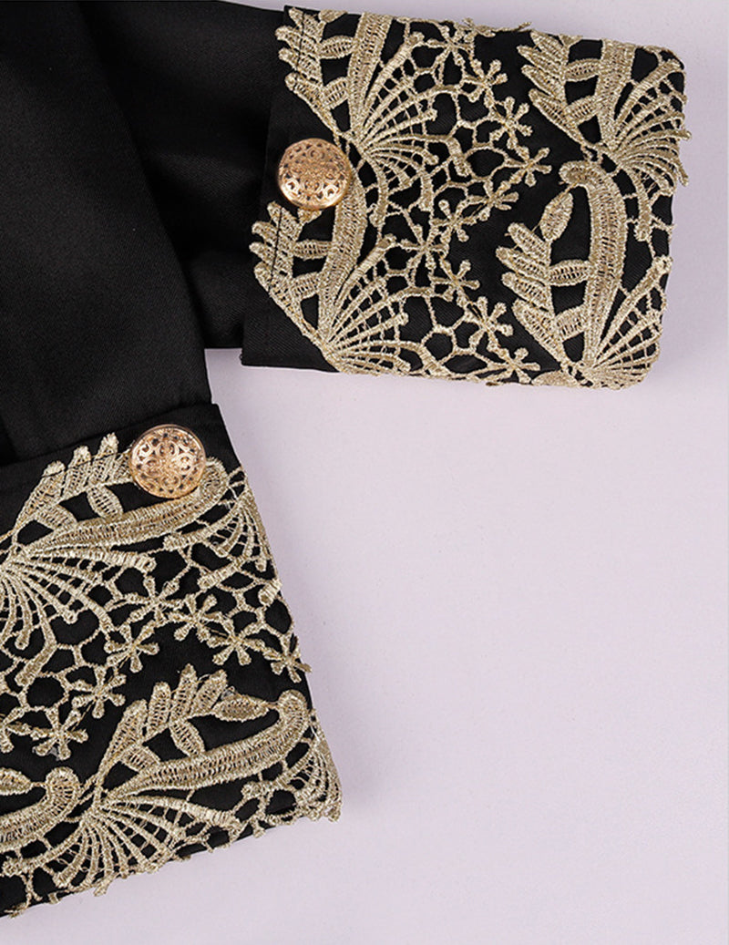 Baroque prince costume sleeve and cuff, black with gold embroidered filigree trim