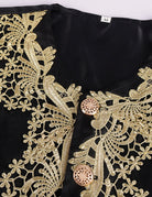 Baroque prince costume embroidered front, black fabric with gold filigree and medallions