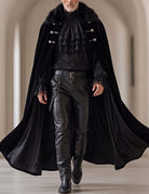 Men's gothic 3-piece set, black cape with faux-fur collar over ruffled black shirt and leather-look pants