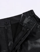 Black leather-look pants detail, zip fly and seam panels with angled side pocket