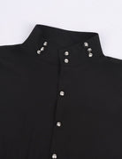 Black gothic shirt neckline with lace ruffle trim and silver-tone snap buttons