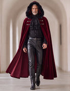 Men's gothic set: buttoned burgundy fur-trim cape, ruffled black shirt, leather-look pants
