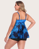 Two-piece tankini set, back view of blue tropical-leaf tankini with black shorts