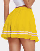 Pleated school uniform skirt in vivid yellow with striped hem band