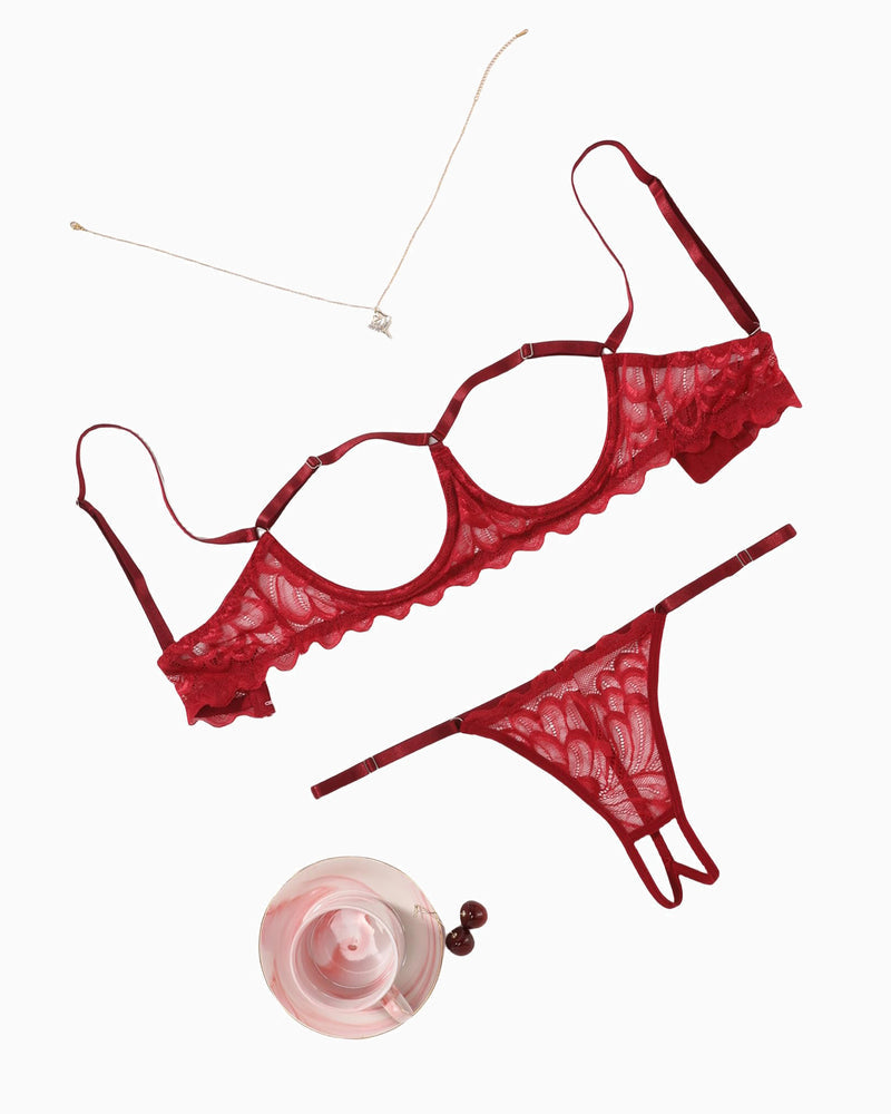 Wine red lace bra and thong panty set, flat lay with matching necklace accessory
