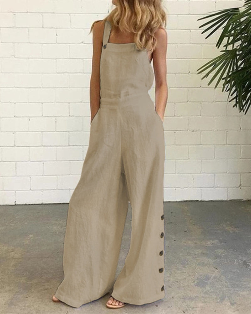 Light beige wide-leg bib romper with adjustable straps and side button placket