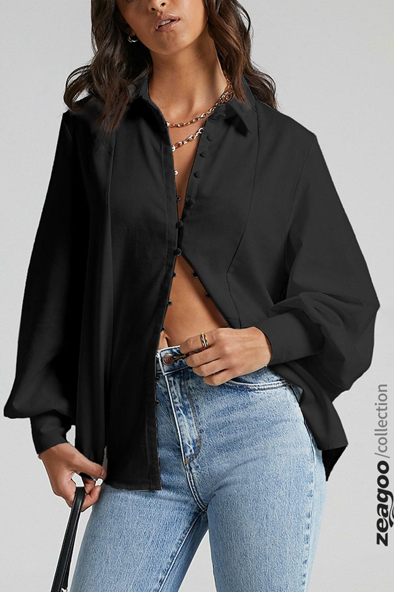 Black long-sleeve button-front blouse with pointed collar