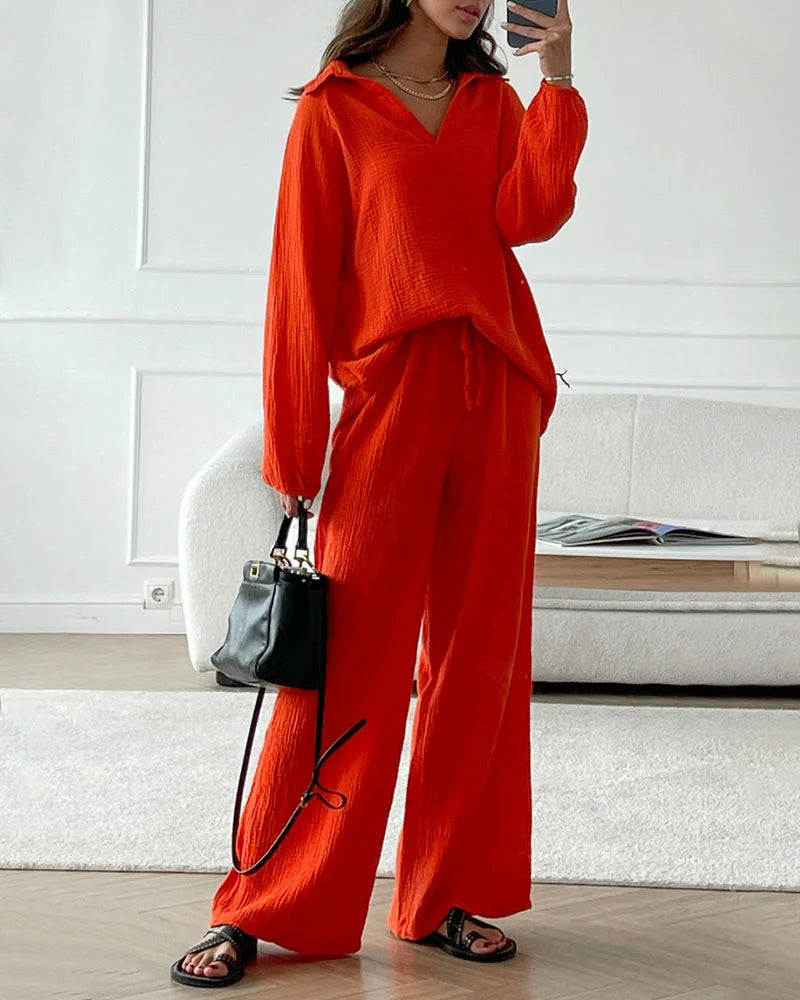 Orange red V-neck two-piece set with long sleeve blouse and wide-leg pants