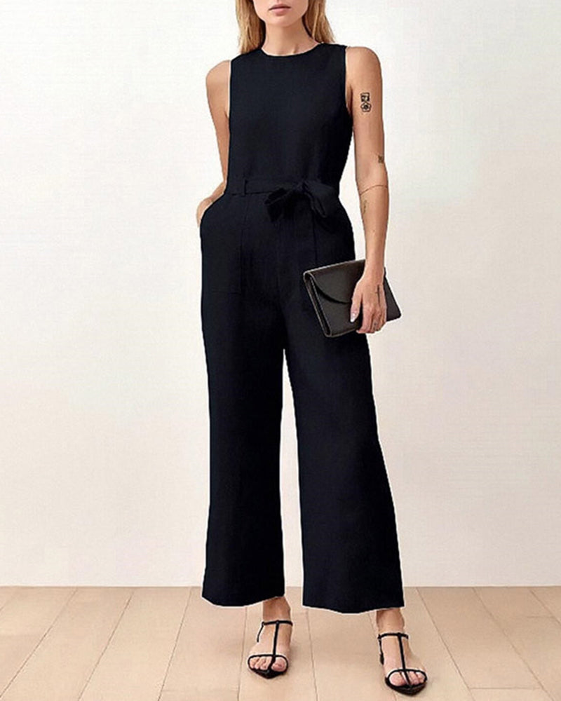 Sleeveless tie-waist pocket jumpsuit in black, wide-leg wide shoulder fit