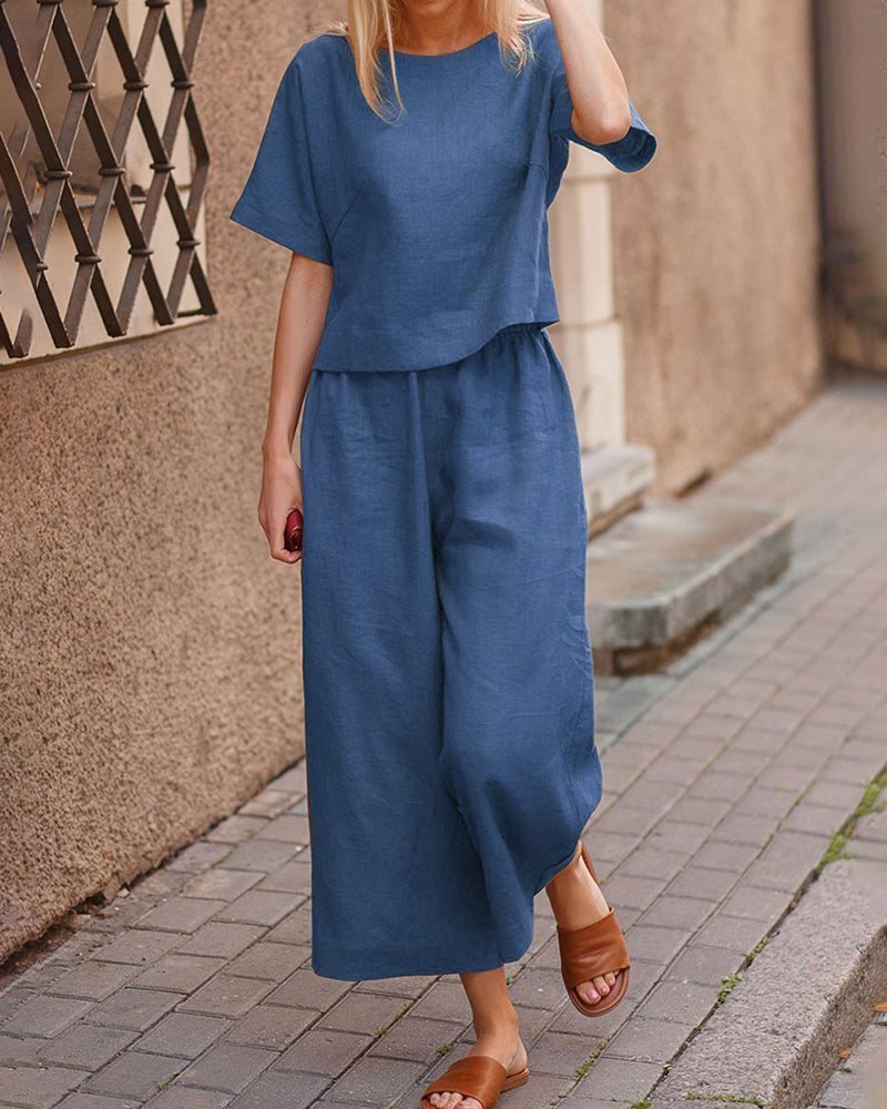 Medium blue two-piece set with loose T-shirt and wide-leg cropped pants