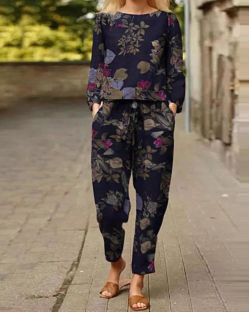 Navy floral print tracksuit set with long sleeves and tapered jogger pants