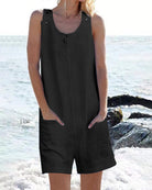 Black sleeveless pocket shorts jumpsuit with button placket and scoop neckline