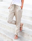 Khaki drawstring jogger pants with front pockets