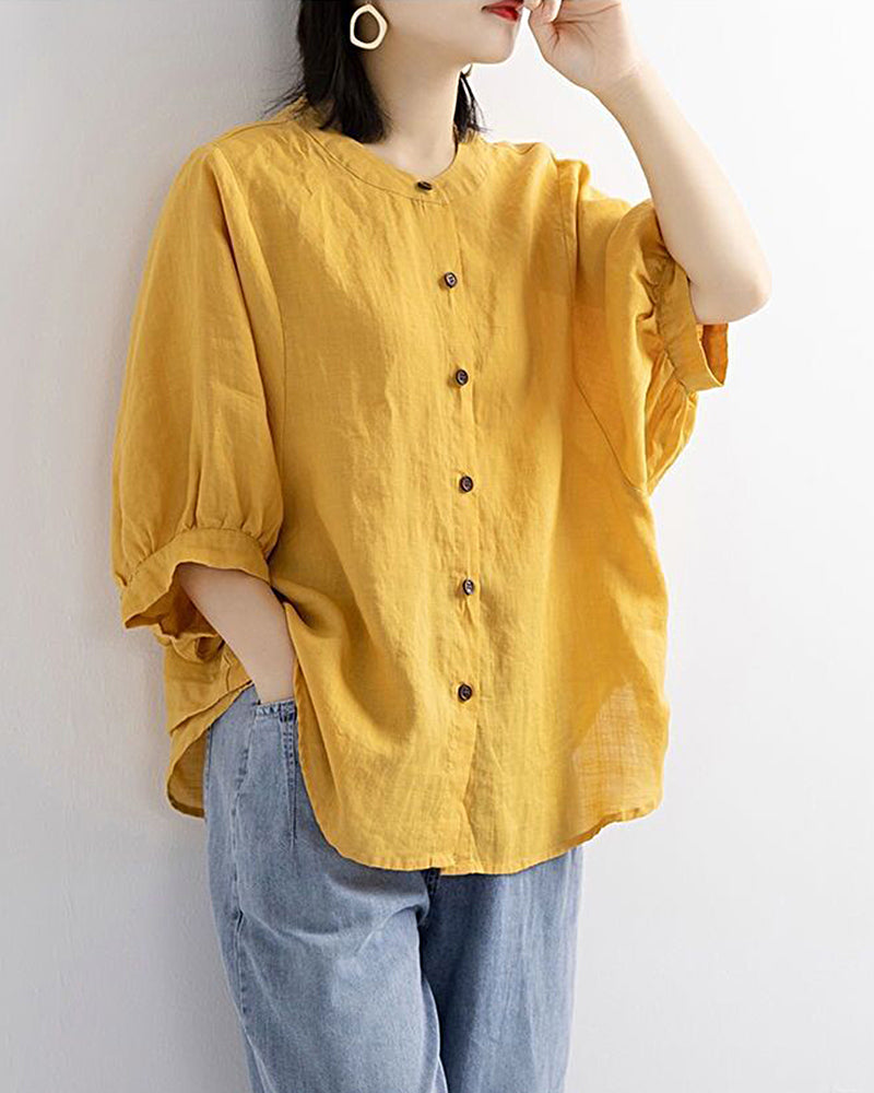 Yellow lantern-sleeve loose shirt with round neck and button front